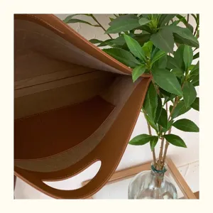 Brown leather 13-inch laptop sleeve detail, slim portable briefcase for women office work.