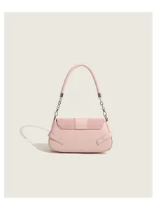 Pink leather baguette shoulder bag detail view with stylish flap lock and metal chain strap.