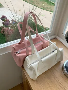 Simple retro tote bag underarm baguette shoulder bag for women, trendy minimalist design.