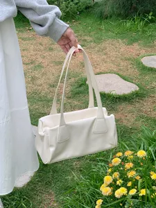 Minimalist vintage shoulder tote bag for women, chic PU leather underarm baguette bag.