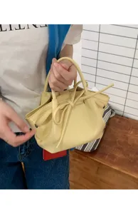 Chic borsa a secchiello gialla da donna, elegante borsa con manico annodato e fiocco, tendenza.