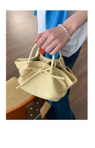 Borsa a secchiello giallo chiaro in stile coreano da donna, design chic con coulisse a fiocco.
