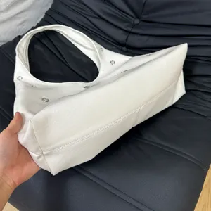 Fashion white leather shoulder bag for women, large capacity rivet underarm handbag daily use.