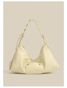Chic retro motorcycle style shoulder bag in light yellow, versatile underarm bag with large capacity.