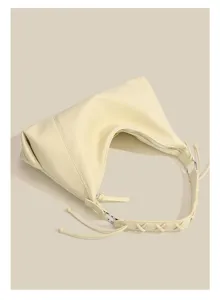Light yellow vintage motorcycle shoulder bag with braided strap and stylish underarm design.