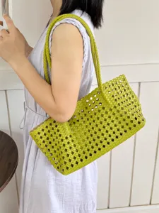 Green woven cutout tote bag for women, stylish summer shoulder bag for daily commute.