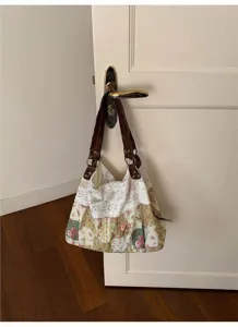 Detail view of Korean retro floral patchwork canvas shoulder bag with elegant white lace trim.