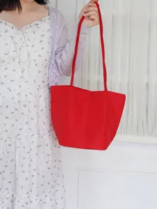 Casual red nylon tote bag for women, lightweight daily commuter shoulder bag with large capacity.