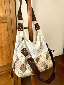 Detailed view of the Korean floral canvas patchwork hobo shoulder bag with elegant lace trim.