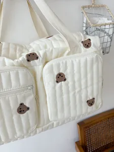 Chic quilted travel tote bag with cute embroidered bears, large capacity mommy bag for use.