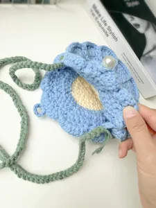 Handcrafted crochet sunflower shoulder bag, cute blue floral crossbody bag with pearl accent.