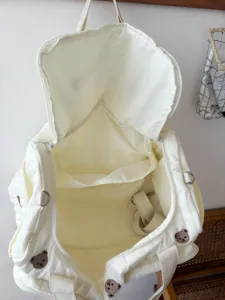 Korean style large capacity quilted travel bag, cute bear embroidery, multi-pocket maternity bag.