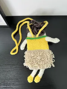 Handmade crochet doll crossbody bag, cute cartoon knitted shoulder phone bag for women.