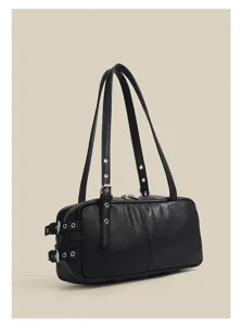 Detailed view of the black retro boston underarm bag with metal buckle straps and chic hardware.