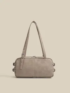 Vintage boston shoulder bag for women, chic pu leather retro underarm bag with metal buckle details.