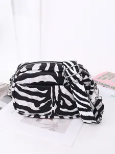 Fashion black and white zebra print PU leather crossbody shoulder bag for women daily use.