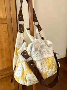 Floral canvas shoulder bag with lace patchwork, casual large capacity hobo tote for daily commute.