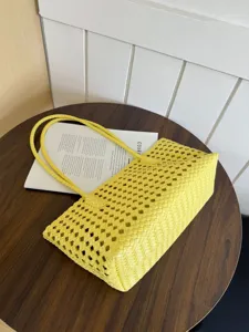 Yellow woven hobo tote bag, stylish summer commuter large capacity shoulder bag for women.