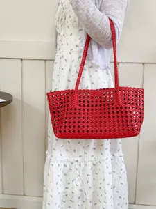 Stylish red woven tote bag for women, large capacity shoulder bag for summer commuting.