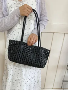 Black woven leather tote bag for women, stylish large capacity shoulder bag for summer daily commute.