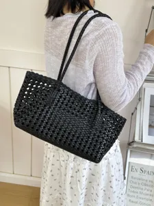 Black woven leather tote bag, stylish large capacity shoulder bag for women daily commute.
