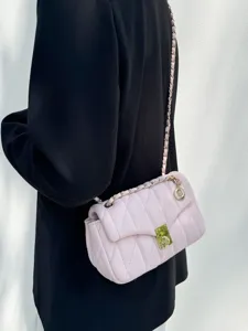 Exquisite quilted chain bag detail, elegant pink shoulder crossbody bag style for chic daily looks.