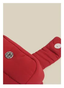 Red quilted mini lipstick bag detail, portable cosmetic pouch with magnetic snap closure.