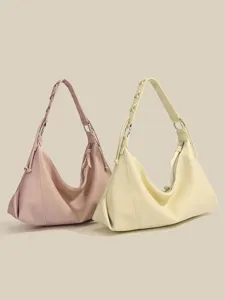 Elegant large capacity shoulder tote bag for women, stylish casual commuting crossbody bag.