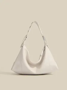 Minimalist off-white hobo shoulder bag for women, elegant commuter dumpling handbag with knot.