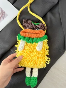 Handmade crochet cute big mouth phone bag detail view, fluffy wool crossbody bag with strap.