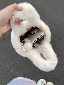 Cute white plush handbag for women, soft fluffy winter bucket bag with top handle.