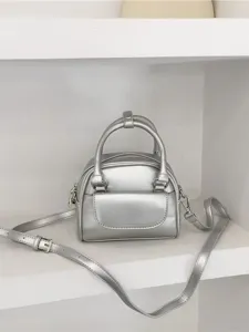 Silver women shoulder bag, trendy PU leather crossbody handbag with top handle and strap.