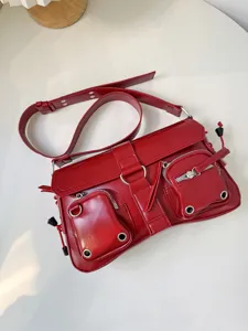 Red motorcycle style PU leather shoulder bag with multi-pockets and zippers for women.