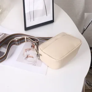 Minimalist solid PU leather crossbody bag, versatile small square shoulder bag with wide strap.
