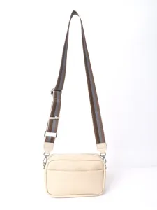 Beige PU leather crossbody bag detail, textured small square bag with wide striped strap