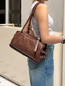 Brown retro boston shoulder bag for women, stylish PU leather pillow underarm bag style.