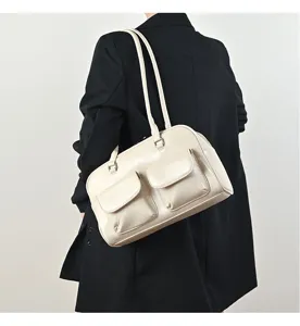 Retro college style women shoulder bag, large capacity PU leather handbag with dual front pockets.