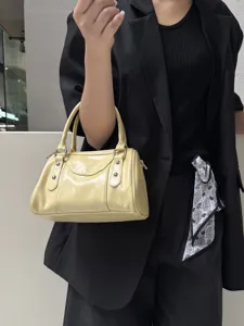 Korean style crinkled patent leather Boston shoulder bag, chic commuting handbag for women.