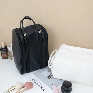 Large capacity travel cosmetic bag, premium PU leather toiletry organizer for women.