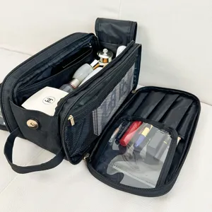 Large capacity black makeup bag detail showing multi-functional travel cosmetic storage.