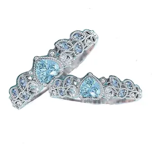 Vista dettagliata anello donna moda cuore blu zircone, vintage foglia filigrana argento.