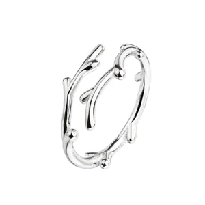 Silver twig antler open ring detail, minimalist style, adjustable fashion jewelry piece.