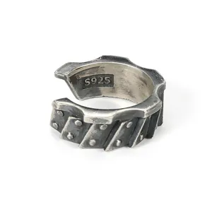 Detailed close-up of a vintage Thai silver men's gear and tread open ring in S925.