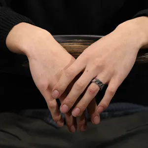 Retro Thai silver gear ring for men, detailed mechanical band ring showcase detail.