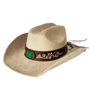 Detail of beige suede western cowboy hat featuring brown band, turquoise buckle and embroidery.