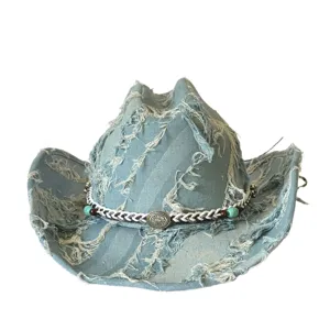 Close-up detail view of vintage distressed denim cowboy hat, frayed raw edge brim, beaded hatband.
