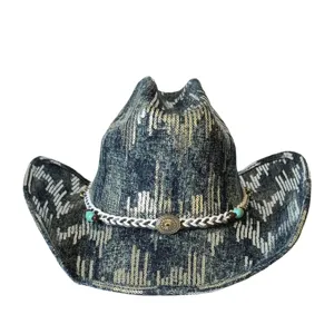 Detailed view of retro western cowboy hat, sequin denim fabric, braided hatband, boho style.