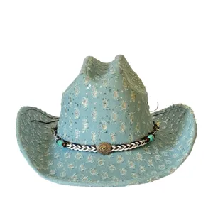 Detailed view of vintage distressed denim cowboy hat with sequins and turquoise beaded band.