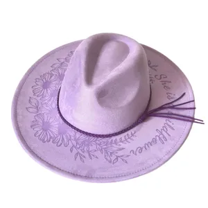 Purple faux suede fedora hat with laser engraved wildflower pattern and braided rope band.