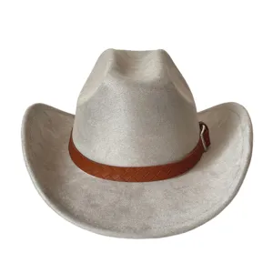 Close-up detail of retro suede western cowboy hat featuring brown woven belt and metal buckle.